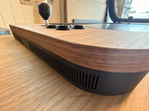 The walnut edge on the black base