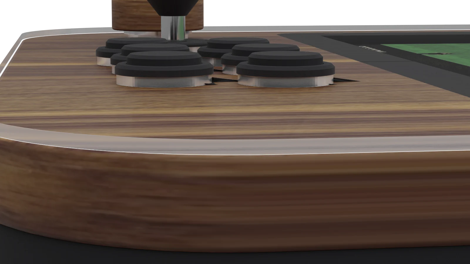 Close up along the edge of the pub edition: a clear acrylic sheet lies on top of the walnut, its cut edge catching the light, the buttons coming up through it and mirrored in its surface